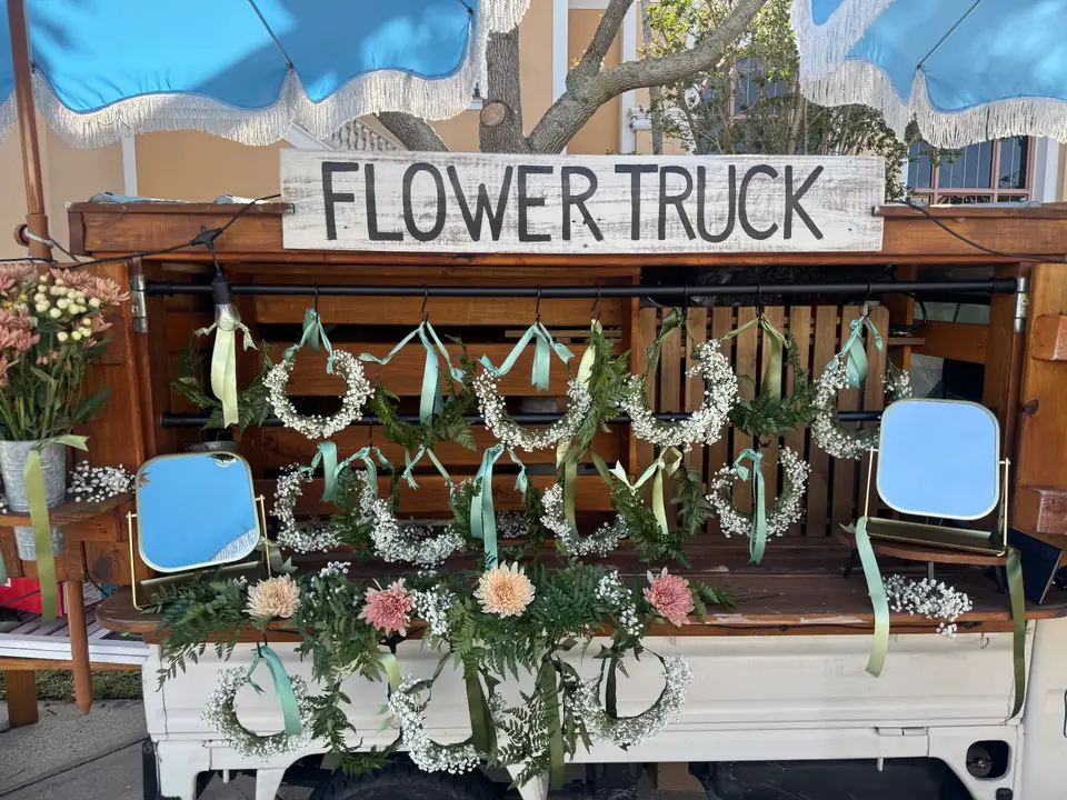 Fresh flower crowns displayed on the truck