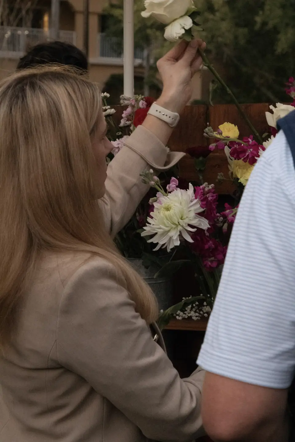 Guest choosing a fresh stem at a corporate reception, Orlando